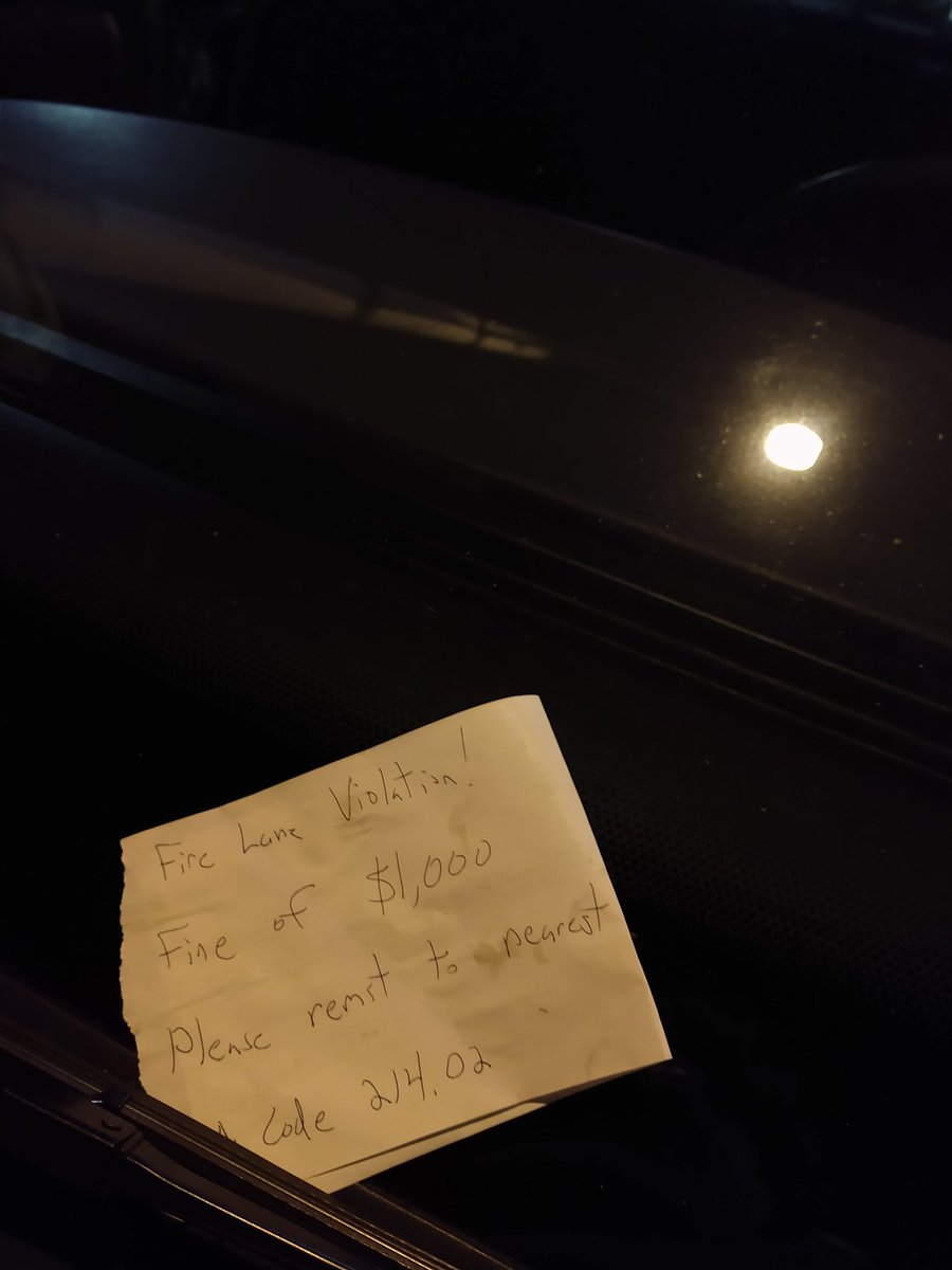 Somebody left a handwritten ticket on this sheriff's cruiser