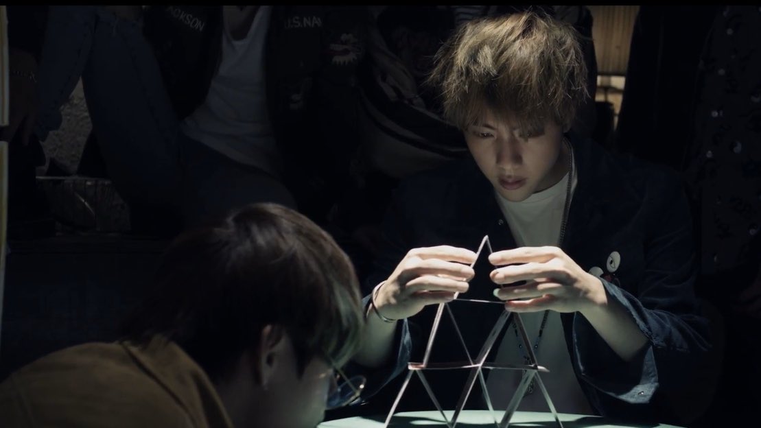 I want to point out that in Run, we see Seokjin building a house of cards. Later when it collapses, he gets a blank look on his face (which he often does in the BU videos!).At this point, Seokjin is already in the time loop, which restarts whenever he fails to save everyone.