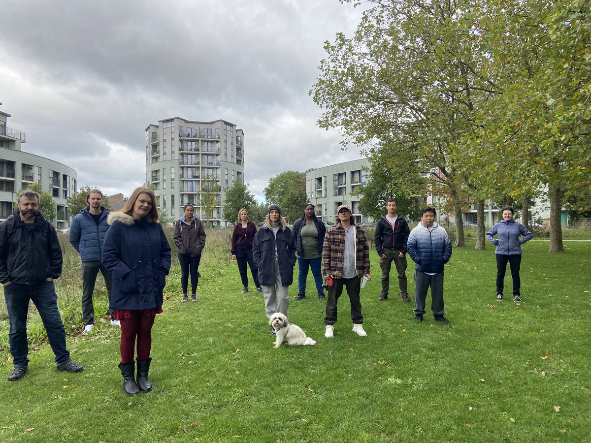 ActionCladding's tweet image. Here we are, in front of the pleasant but unsafe homes we were sold by @NHGhousing who are taking no responsibility for solving our crisis. The beauty of the park opposite contrasts with the man made hell of our #claddingscandal