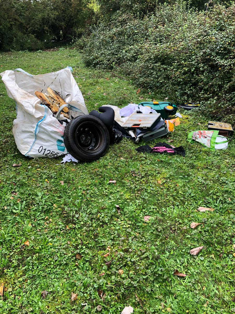 BasGazette's tweet photo. Does anyone in Basingstoke recognise any of these items? They were dumped at the children's cemetery, causing upset to parents visiting the graves of their loves one. https://t.co/LMFH7A5urP