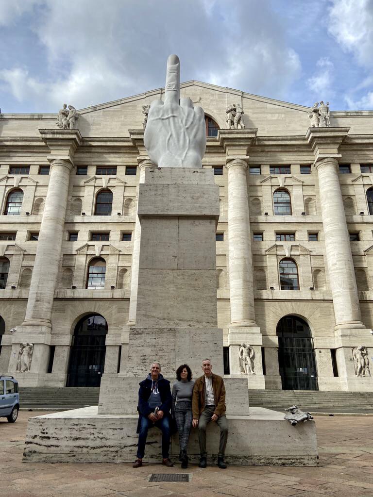 MilanGreeters's tweet photo. Last tour before masks are also required outside. Here Greeter Fabio with Mikel and Karmele with Cattelan’s “Finger” behind them #milan #milano#freewalkingtour #internationalgreeterassociation #contemporaryart #mauriziocattelan #scultura #square #design #designweekmilano #polimi https://t.co/nX1BbUa7Dr