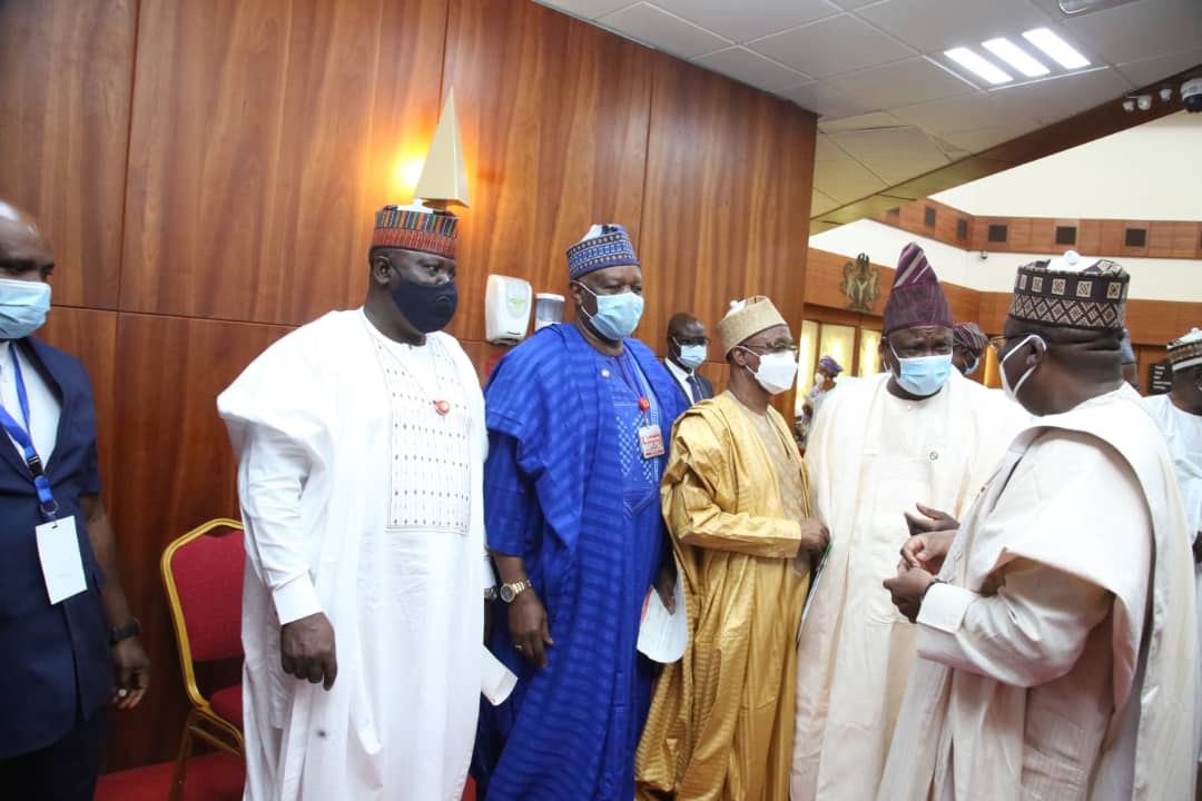 Senator Ibikunke Amosun at 2021 budget presentation flagged by  Senator Ahmed Lawan Senate President  and Senator Obarisi Ovie Omo-Agege Deputy Senate President.
