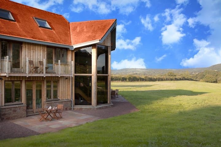 The Ash, a deluxe and really unique apartment in Marion (close to Hereford)Cost: £44 a night. YEP.Guests: 2Insane views in the Herefordshire countryside, cosy settings.  https://abnb.me/IyL9OuSbqab 