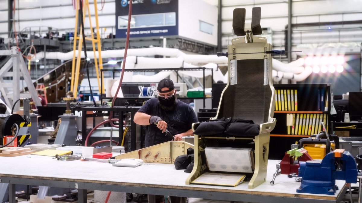 Preparing a pilot seat ready for install on the next spaceship in <a href="/virgingalactic/">Virgin Galactic</a>’s fleet.