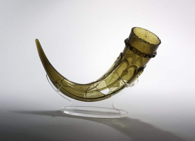 A 7th-century Anglo-Saxon glass drinking horn, from Rainham, London:  https://www.britishmuseum.org/research/collection_online/collection_object_details.aspx?objectId=87164&partId=1