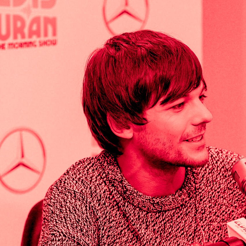 Louis Tomlinson in a red filter coz this man fooking owns this color !!