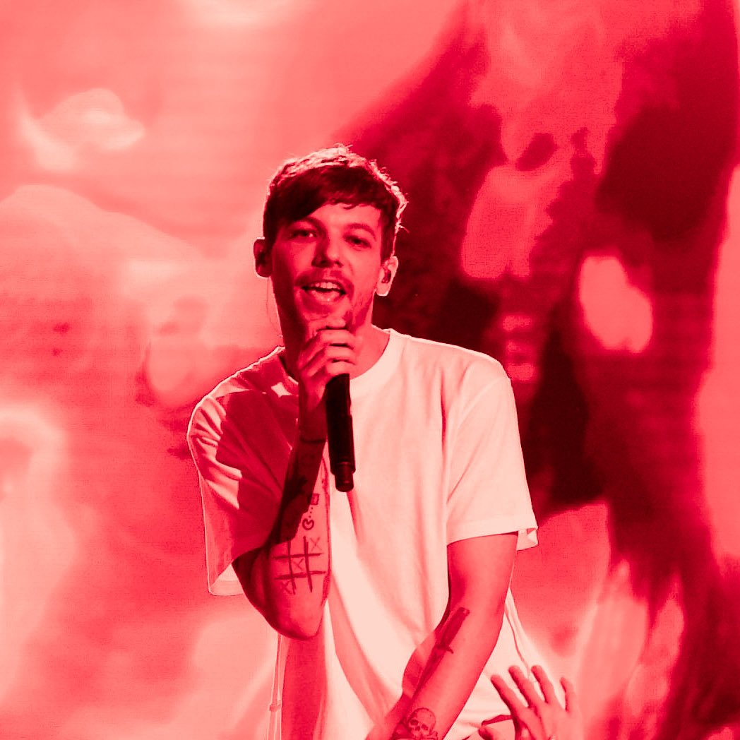 Louis Tomlinson in a red filter coz this man fooking owns this color !!