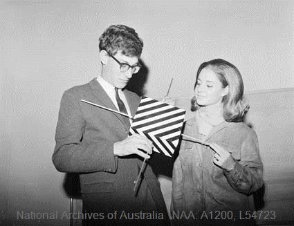 More Australis Oscar 5! Richard Tonkin, Director of the Australian Space Ventures, shows Australia's satellite to Miss University of Melbourne 1965-66, Robyn Jewell (Image NAA)  #Space4Women  #WomenwithSatellites