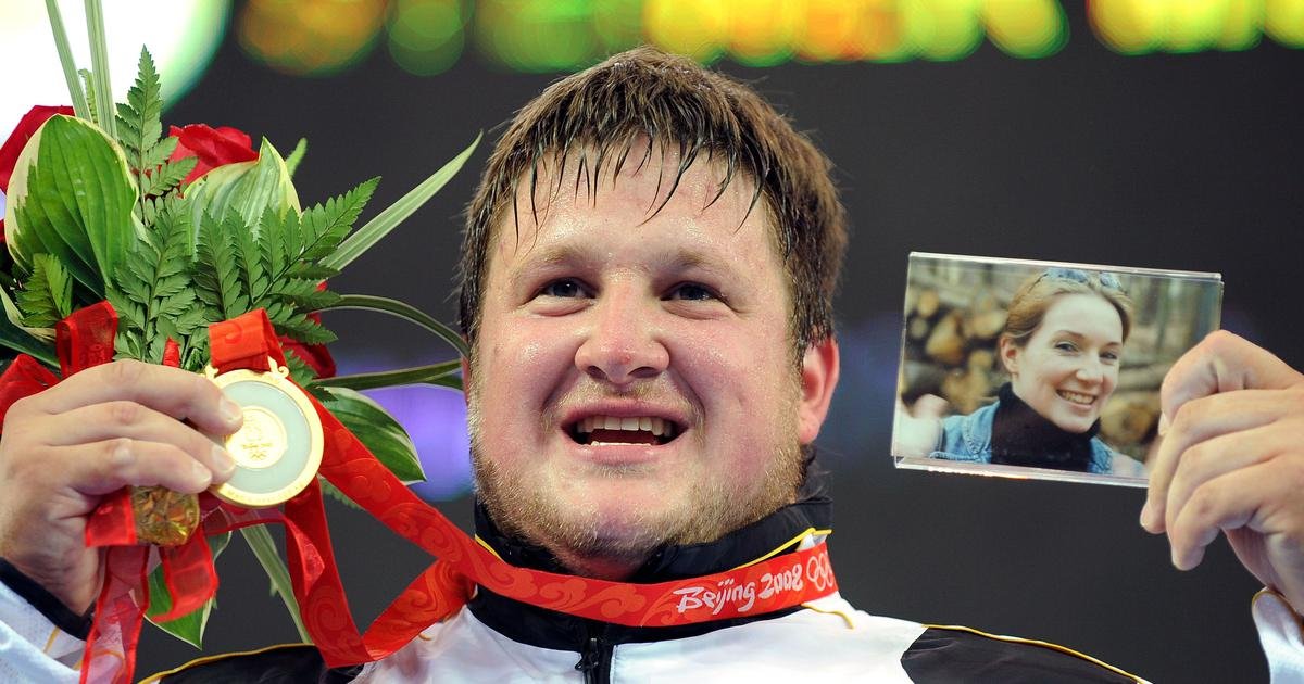 #78In the months leading up to the 2008 Olympics,  weight lifter Matthias Steiner's wife Susann died in a car accidentAt the competition itself, he lifted 258kg in Clean and Jerk to win-he said he felt his wife was there and aptly thus carried her picture on the podium