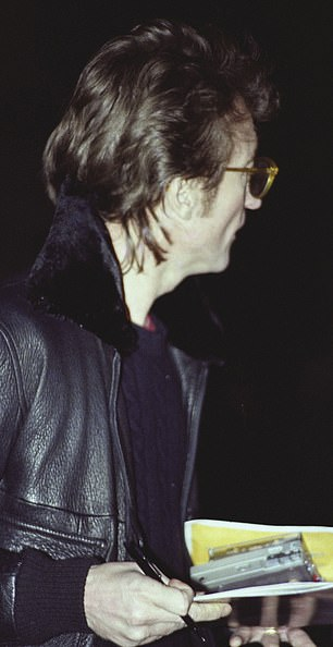 This is said to be John Lennon signing the autograph for one Mark David Chapman. Mark David Chapman would later gun down John Lennon and would remain at the scene reading The Catcher in the Rye.