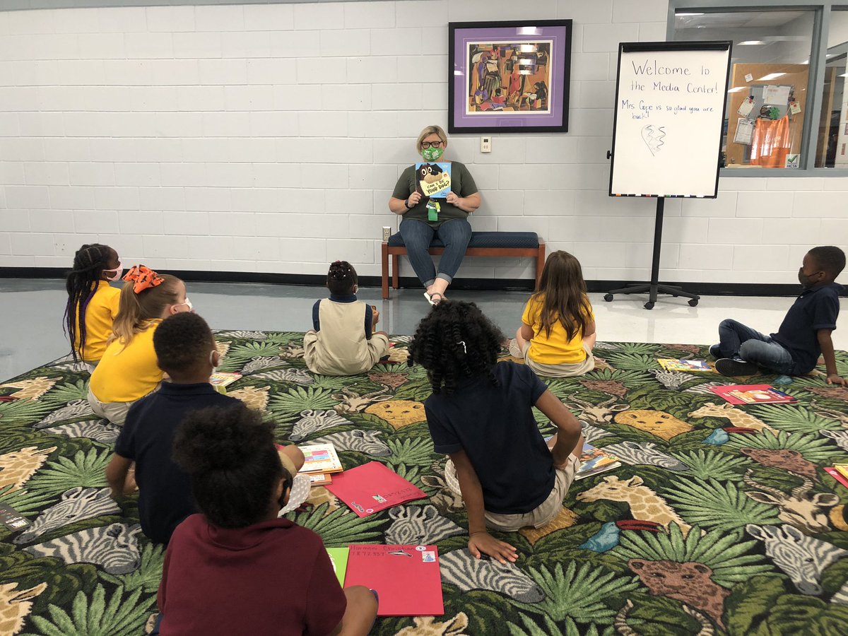 NikDawson4's tweet photo. My first grade babies and I love Friday mornings because we get to spend it with @Mrscopeslibrary ❤️ Thanks for helping our kids grow and learn great reading strategies at the @oakparklions library! @SSYRAJR #allin 📖 https://t.co/UZr8kUCrT0
