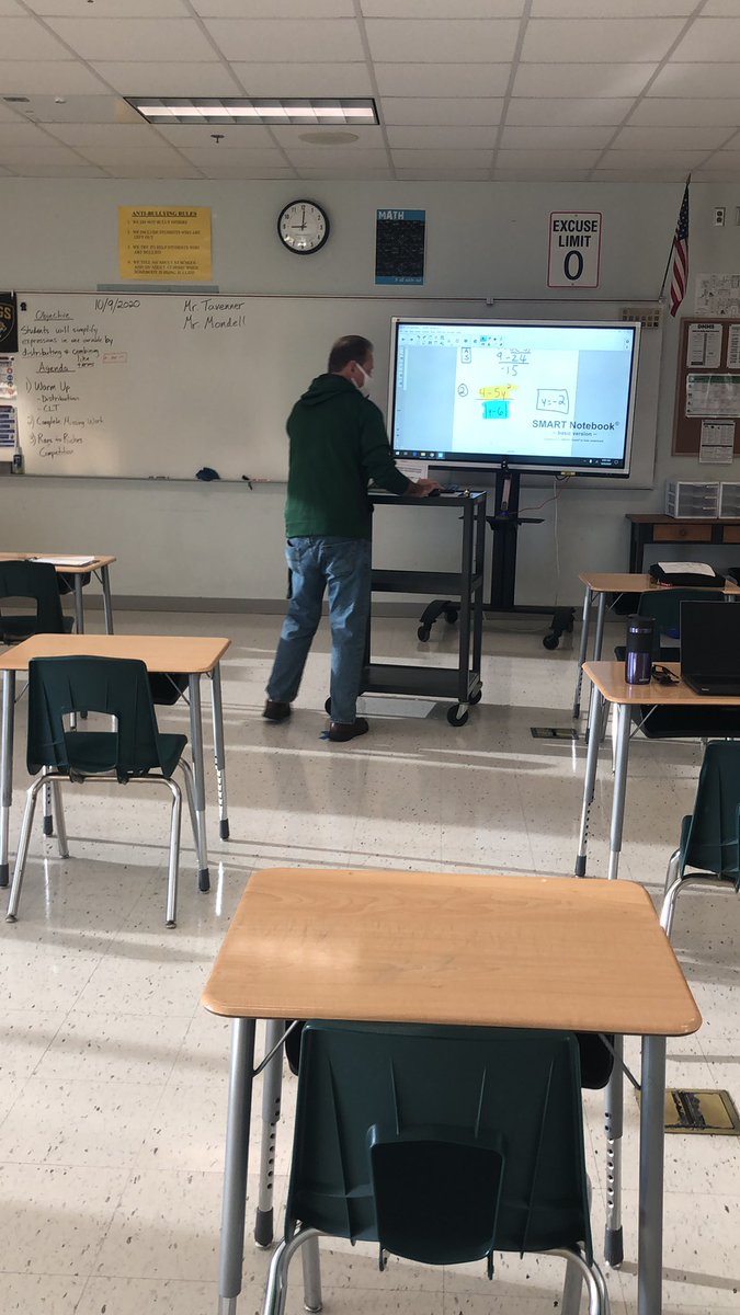 Mr. Mondell may look like he’s teaching to an empty room, but he’s actually working with a great group who got up early to join a google meet for math help! 🌅 <a href="/dmmswps/">DMMS Riflemen</a>