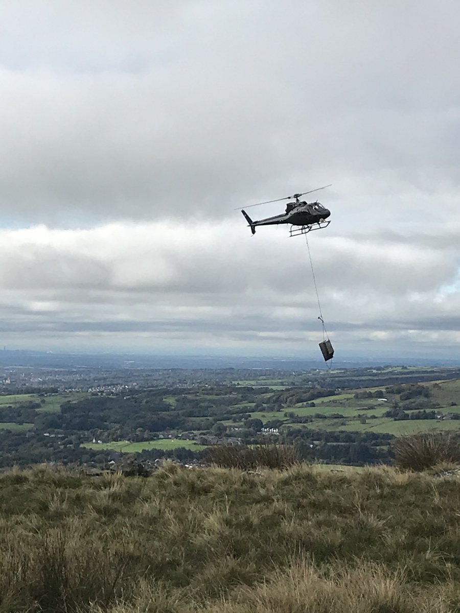 EnvAgencyNW's tweet photo. Lovely day on Holcombe Moor yesterday seeing the 🚁  carrying stone to create ‘gully blocks.’ This enables 🌱 to establish on the peat, helping to #slowtheflow, reduce #erosion &amp; boost #biodiversity &amp; #carboncapture 

Find out more ⬇️

https://t.co/M01lj6Mi25

#FridayMotivation https://t.co/wPmcExNCLR