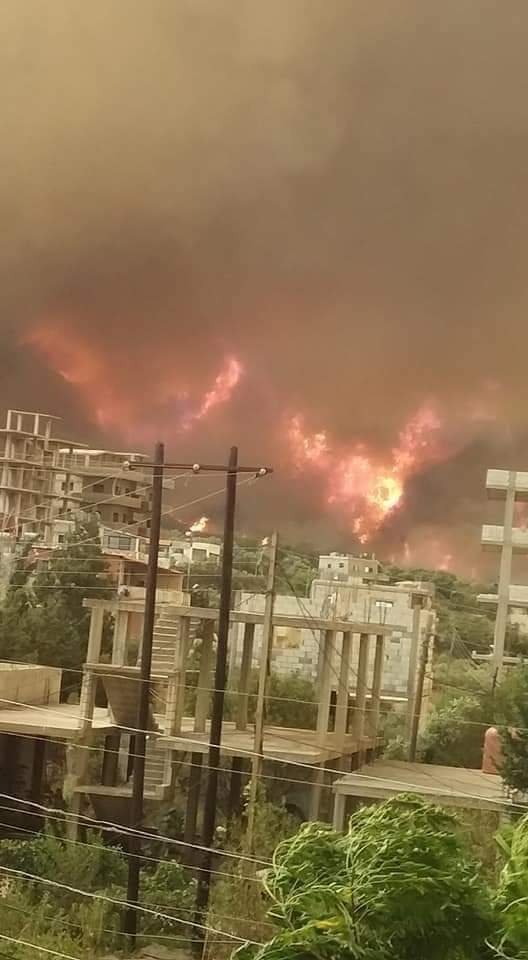 Fires reached the town of Em el-Tiyour on the other side of the former video.  https://www.google.com/maps/@35.7464575,35.8454017,649m/data=!3m1!1e3