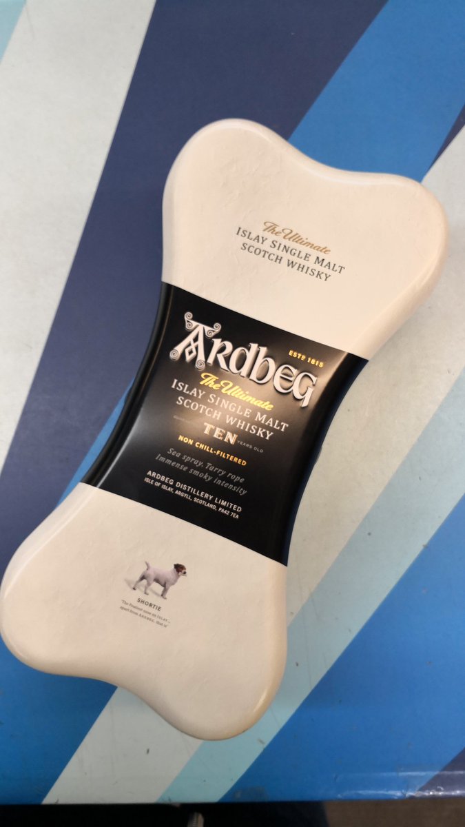 Shortie just got a treat!! New package from <a href="/Ardbeg/">Ardbeg</a> 
Love my #Whisky love my #dogs 
#treat
