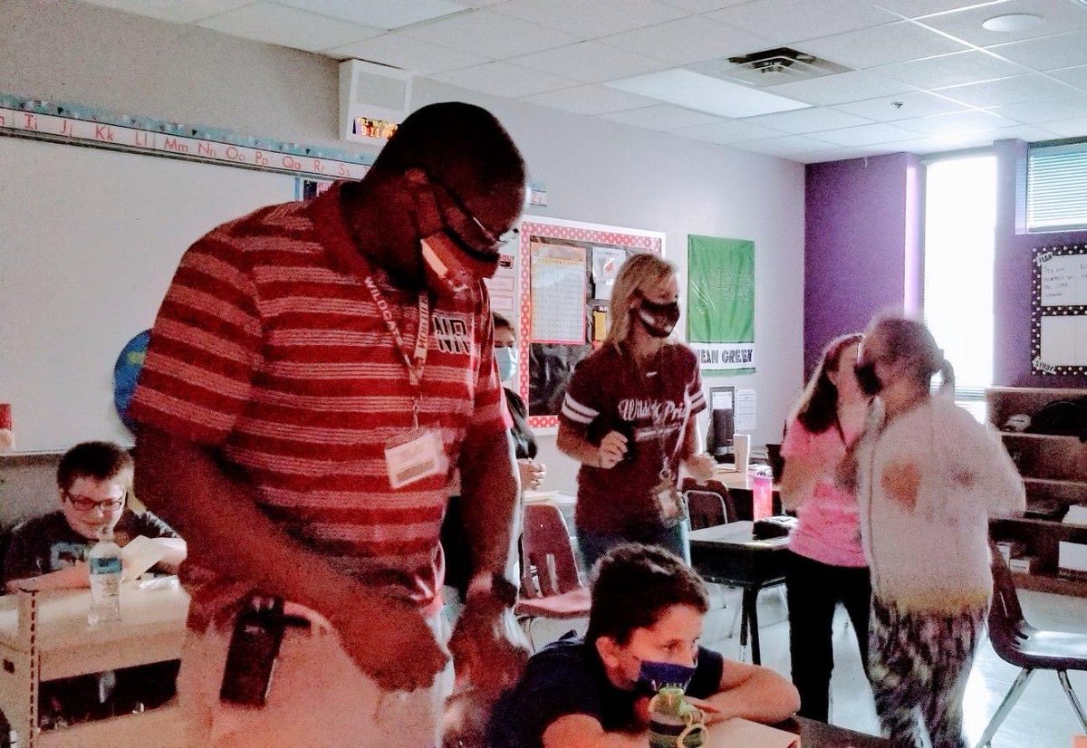 hillary_friday's tweet photo. AABLE students starting their Friday off right by dancing to the Friday song with Principal Davis and Mrs. Friday! #itsagreatdaytobeawildcat #bisdshines https://t.co/ZZZ87F7tKT