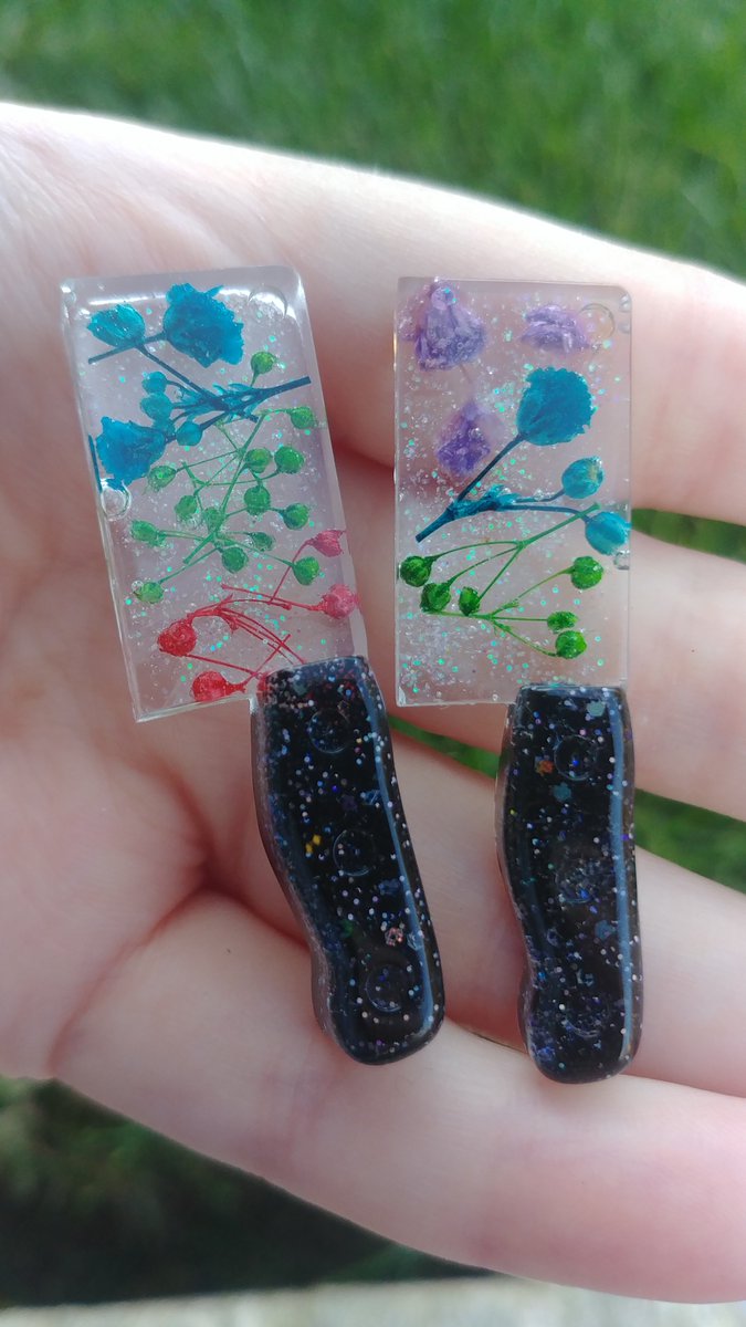 time for some floral knives!! these are $15ea or 2 for $25 and can be made into pins, keychains, pendants, etc., at no extra cost~hatchets: teal, yellow, and purplesingular blade: purple honeysucklebutcher blades: pink-green-blue baby& #39;s breath, green-blue-purp baby& #39;s breath