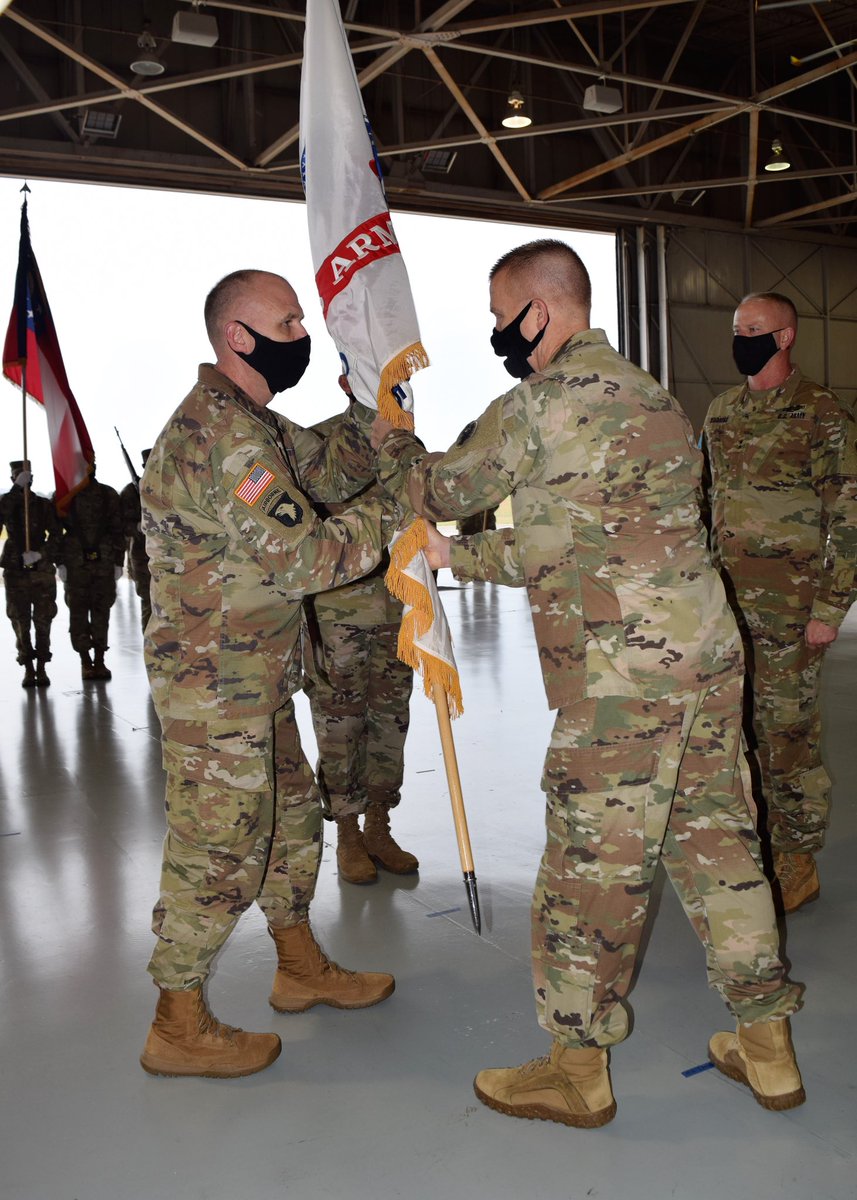 GeorgiaGuard's tweet photo. Brigadier General Dwayne Wilson, incoming commander of the Georgia Army National Guard, accepts the organizational colors from Maj. Gen. Tom Carden, @TAGofGA during the Ga. ARNG’s change of command ceremony at the Clay National Guard Center, Marietta, Ga. Oct. 9, 2020. https://t.co/aG8wOPJxzD
