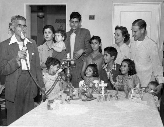 justinamash's tweet photo. America welcomed my dad (center) and his family 64 years ago on this day. They were Palestinian Christian refugees in search of hope. Thank you to the Wagoner family for making the sacrifice to sponsor them. We are blessed to live in a country full of generous and kind people. https://t.co/3VLS0dDZpO