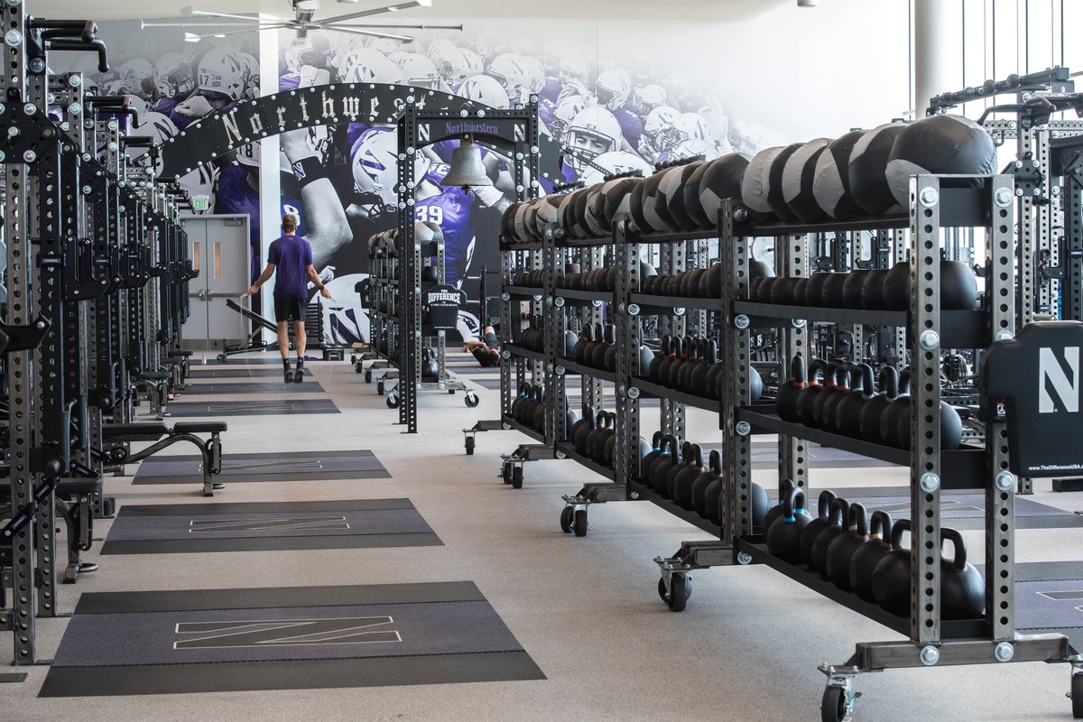 NU_Sports's tweet photo. That time of the week: #FacilityFriday 

The @NUFBFamily weight room is unlike any other 🌊🏋️‍♂️🏈

#GoCats | @Wintrust https://t.co/0iQlYTmRz3