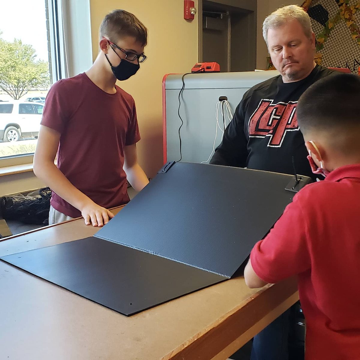team18460's tweet photo. Game elements came in! Field setup time! @andymarkinc #fieldsetup #FIRSTGAMECHANGERS #ULTIMATEGOAL #TexasTeams https://t.co/XzeWq2PjBx