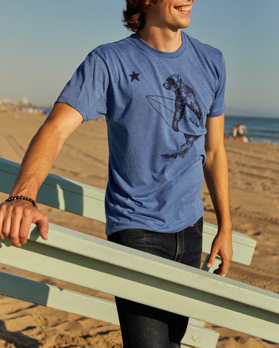 It only makes sense that the California Bear surfs too. 🐻🌊 Shop our t-shirt here: bit.ly/2GC7GHK
