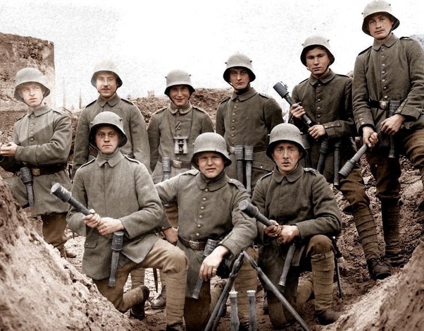 The faces of the three men in the first row all say so many different things about war...
