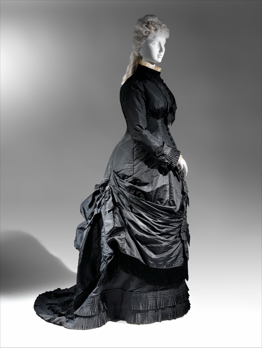 For deepest mourning clothes were to be black, symbolic of spiritual darkness. Dresses for deepest mourning were usually made of non-reflective paramatta silk or the cheaper bombazine – many of the widows in Dickens’ novels wore bombazine.