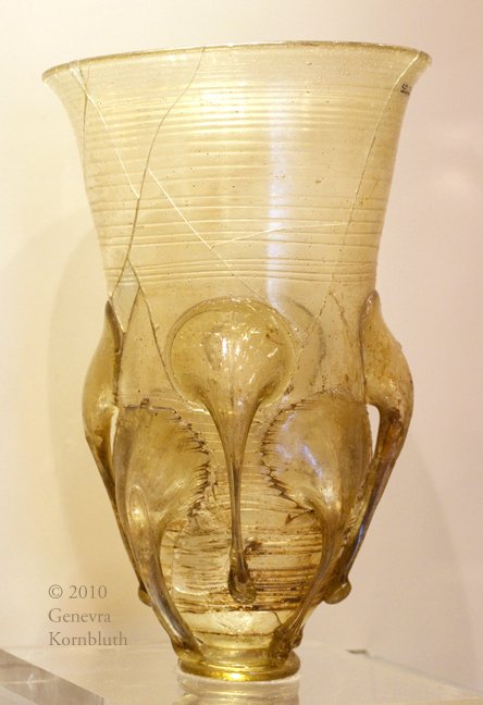 A 6th-century glass claw beaker from Selzen (Germany), grave 3:  http://www.kornbluthphoto.com/images/SelzenBeaker.jpg