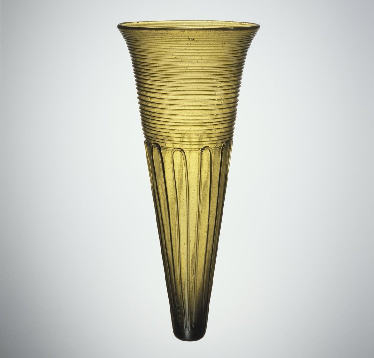 An early Anglo-Saxon cone beaker, 5th–6th century, found at Acklam, Yorkshire, England, in 1892:  https://www.cmog.org/artwork/cone-beaker-0