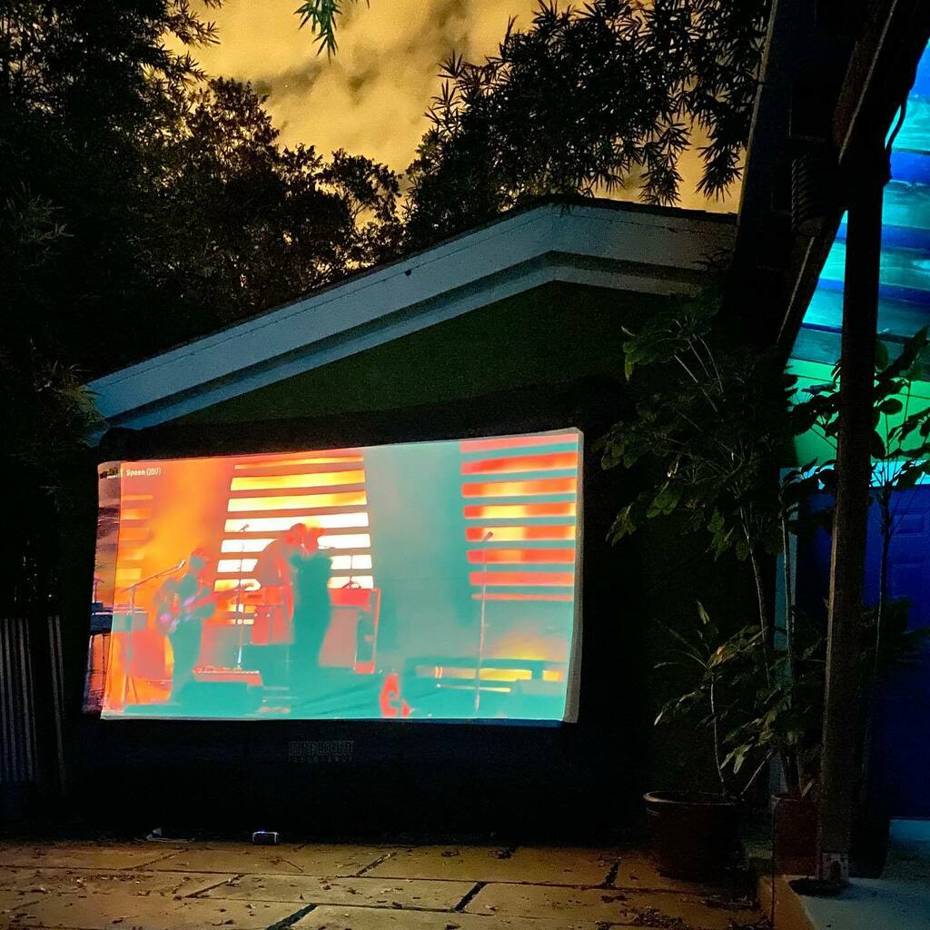 DaveWR's tweet photo. Making the most of it! ACL Fest 2020 on my backyard projector with @spoontheband @aclfestival #saveourstages #livemusic #austintexas #atxmusic https://t.co/TIHBSXYiui