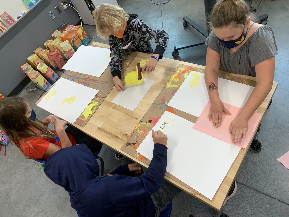 Second graders doing some printmaking of koi fish after learning about Hokusai’s great wave.
