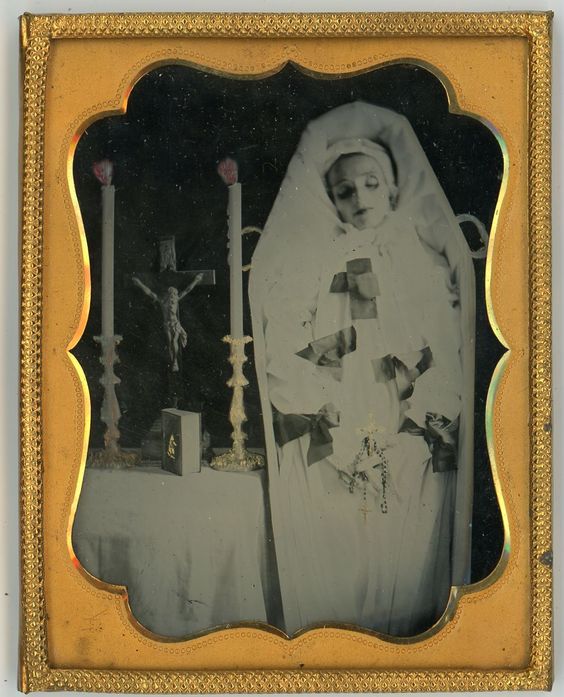 The invention of the daguerreotype in 1839 by Louis-Jacques-Mandé Daguerre gave rise to post-mortem photographs. A common practice would be to pose the deceased in a realistic domestic setting.