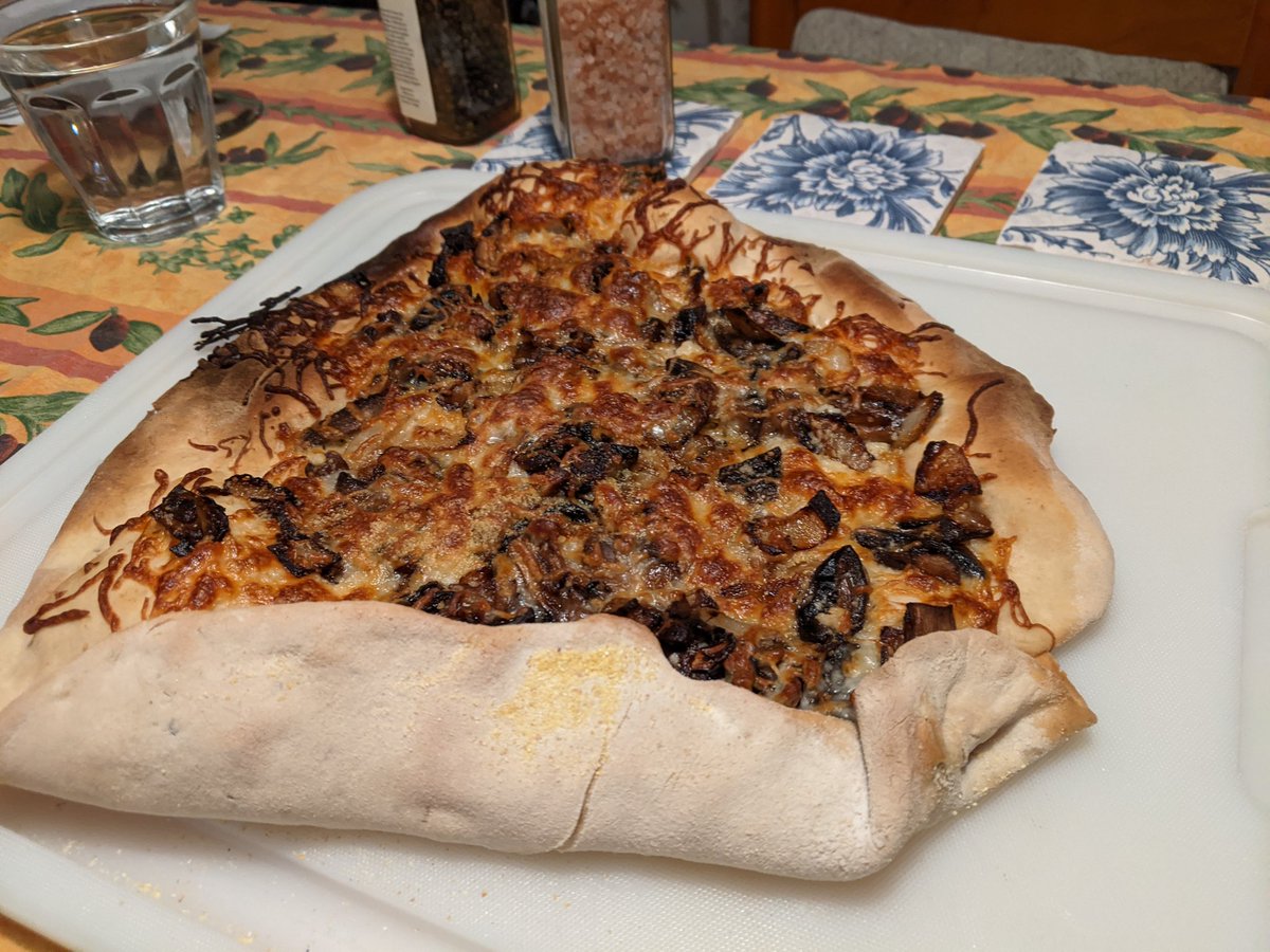 Pizza 1, mushrooms. Bad angle cuz I had to fold it over in the oven. But good pizza.