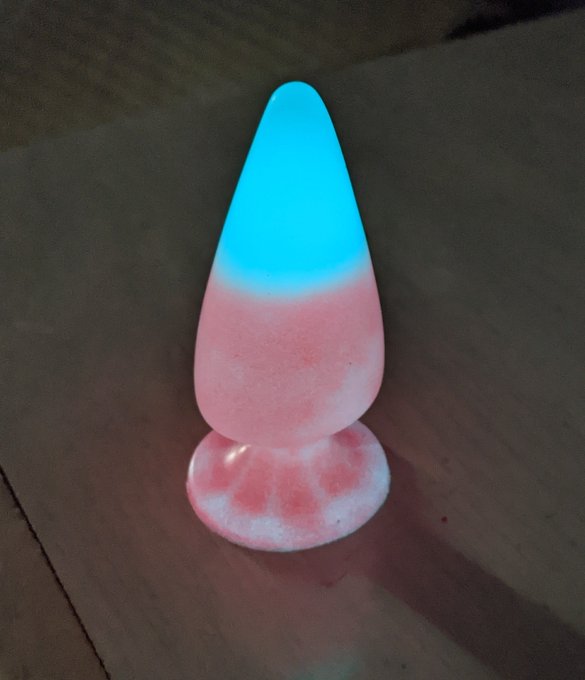 Phosphorescent mixture for a Glow in the Butt Darkplug. (Dim lighting VS pitch plack, unedited photos)