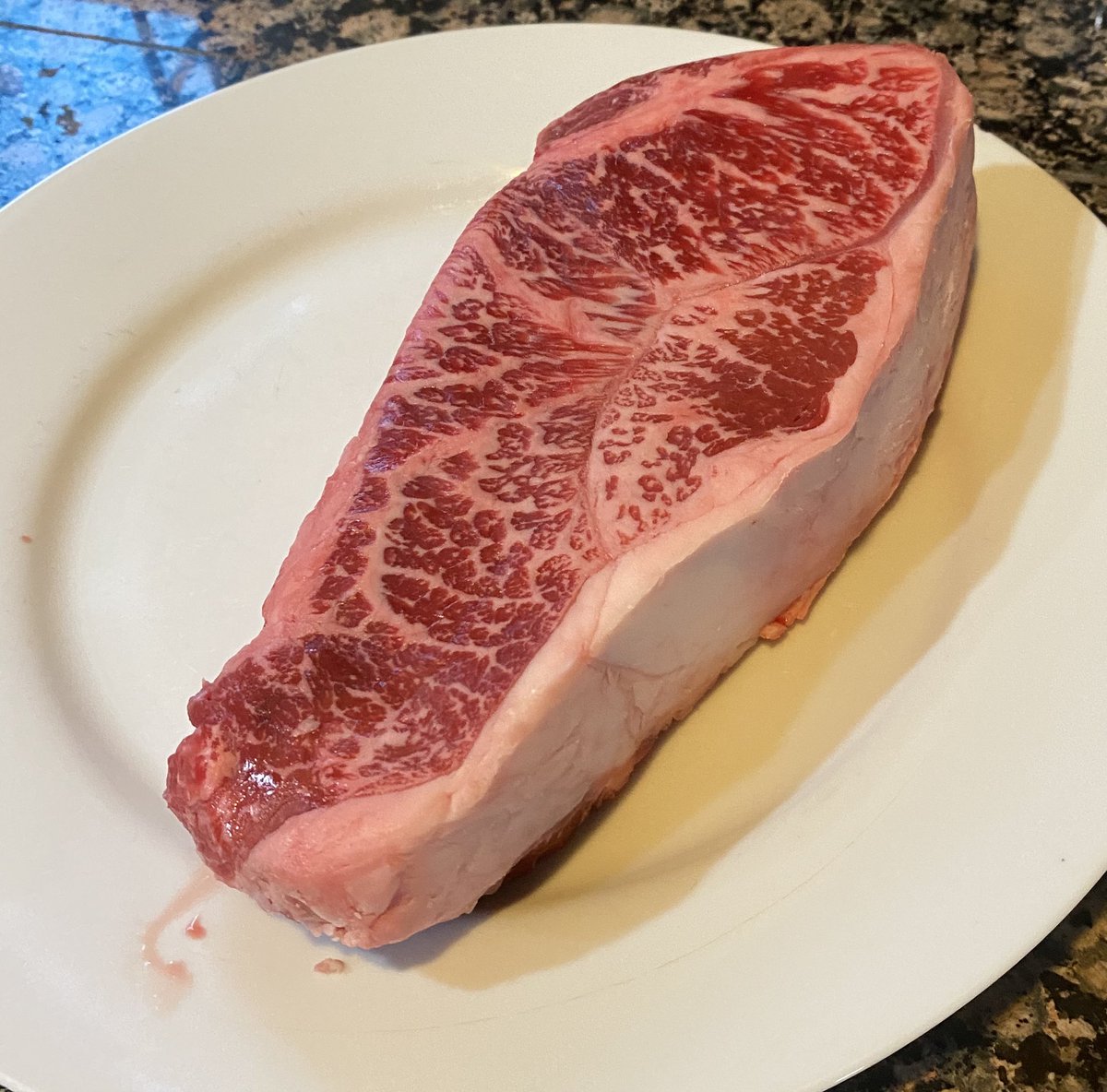 Tonight’s Downtown Fry’s American Wagyu NY strip for $27 is this beautiful 22 ounce sacrifice that I will cook rare and maybe die after I eat it but it’s worth it tbh