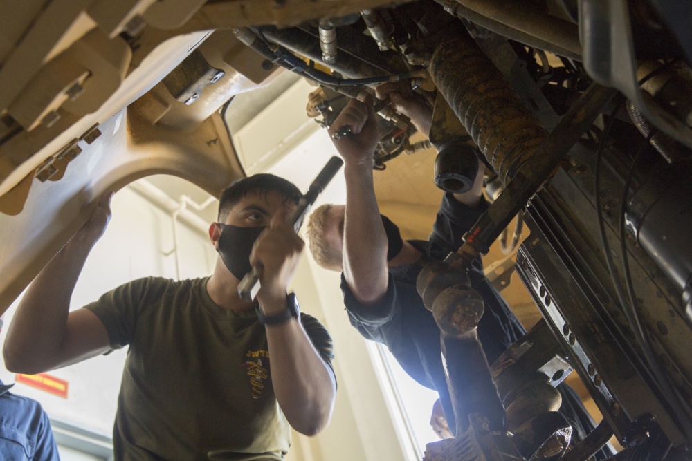 USPACOM's tweet photo. U.S. @PacificMarines assigned to Headquarters Bn, #3MARDIV explore and perform preventative maintenance on the brand new Joint Light Tactical Vehicle #JLTV on Camp Hansen, Okinawa. #NewToys #SemperFi #KeepUp #FreeandOpenIndoPacific. https://t.co/ylq7YYym9e