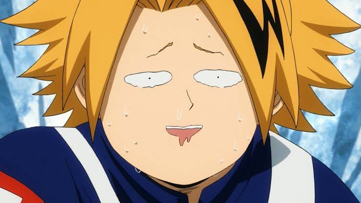 Kaminari Denki: Aho tzura (アホ面).アホ(aho): idiot, foolish面(tsura): face. but not polite/derogatory. The better word for “face” is 顔 (kao). When put together with other words “tsura” will change into “tzura”.He would also sometimes call him by “Kaminari”