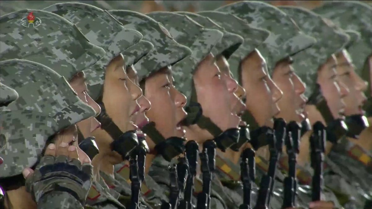 No masks or social distancing at North Korea's military parade among participants, leaders, or spectators.