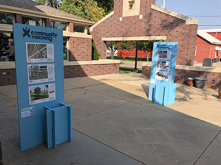 CommunityVisio2's tweet image. ISU interns road-tripped to Fairfax last Tuesday to install  kiosks showcasing design proposals by RDG Planning &amp;amp; Design. The kiosks are located in Fairfax Public Library courtyard. If you&apos;re in Fairfax, be sure to take a look! #CommunityVisioning2020 #CommunityDrivenDesign