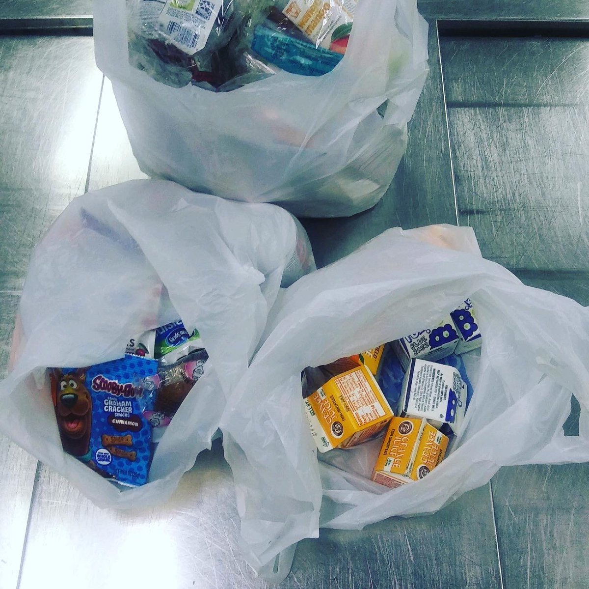 WCDE_NUTRITION's tweet photo. We are handing out meals to children to last them all fall break. Pictured is what each child will receive prior to leaving for fall break. We are so excited to offer this to our children. 🍎🍏❤️ https://t.co/QoK229TJow