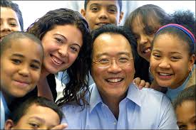 bankstreetedu's tweet image. A little bit about me: Was a mg bilingual teacher (here I am w/ my 6th graders when Yo-Yo Ma visited ahh!), then lit consultant w/ @TCRWP, former grad student and instructor @Hunter_College, @GCUrbanEd alum, and now teaching at Bank Street! #LanguageSeries #LanguageSeries2020