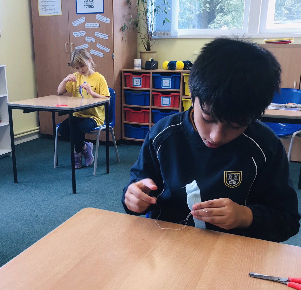 BedstoneCollege's tweet photo. Last week Junior 2 made World War Two salt dough medals. 
This week they are learning to sew their own ribbons for their medals to hang on #WWII #caritas https://t.co/pRo9O1JKGp