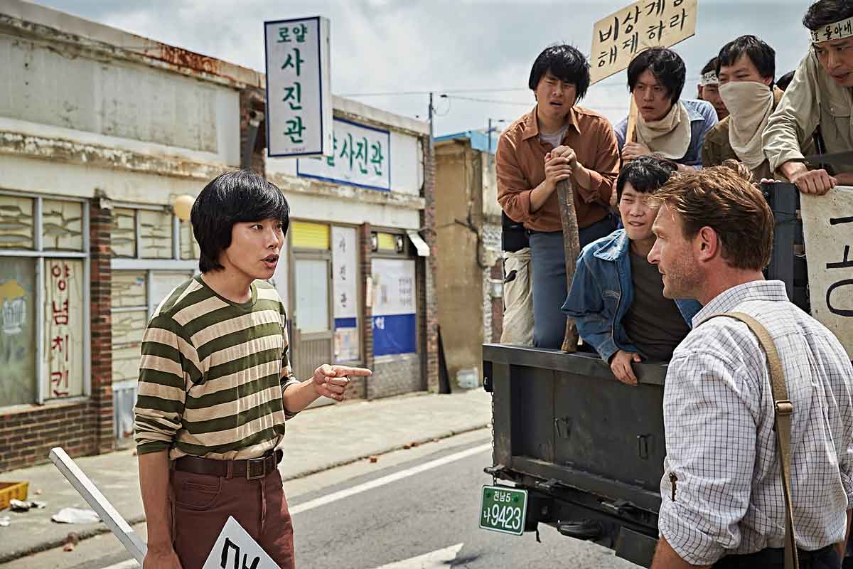 50. A Taxi Driver (2017)In 1980, a foreign journalist hires a down-on-his-luck taxi driver to take him to Gwangju, South Korea. They soon arrive to find a city under siege by student protesters and the military.