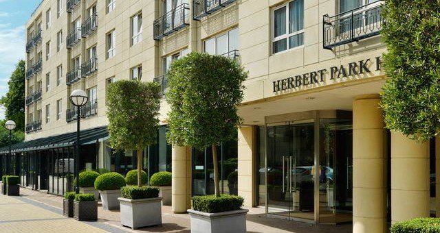 Those who knocked O'Rahilly's house own the neighbouring Herbert Park Hotel. Would be keen to see how word can be got to visiting Diaspora and tourists not to support a body that levels heritage sites.