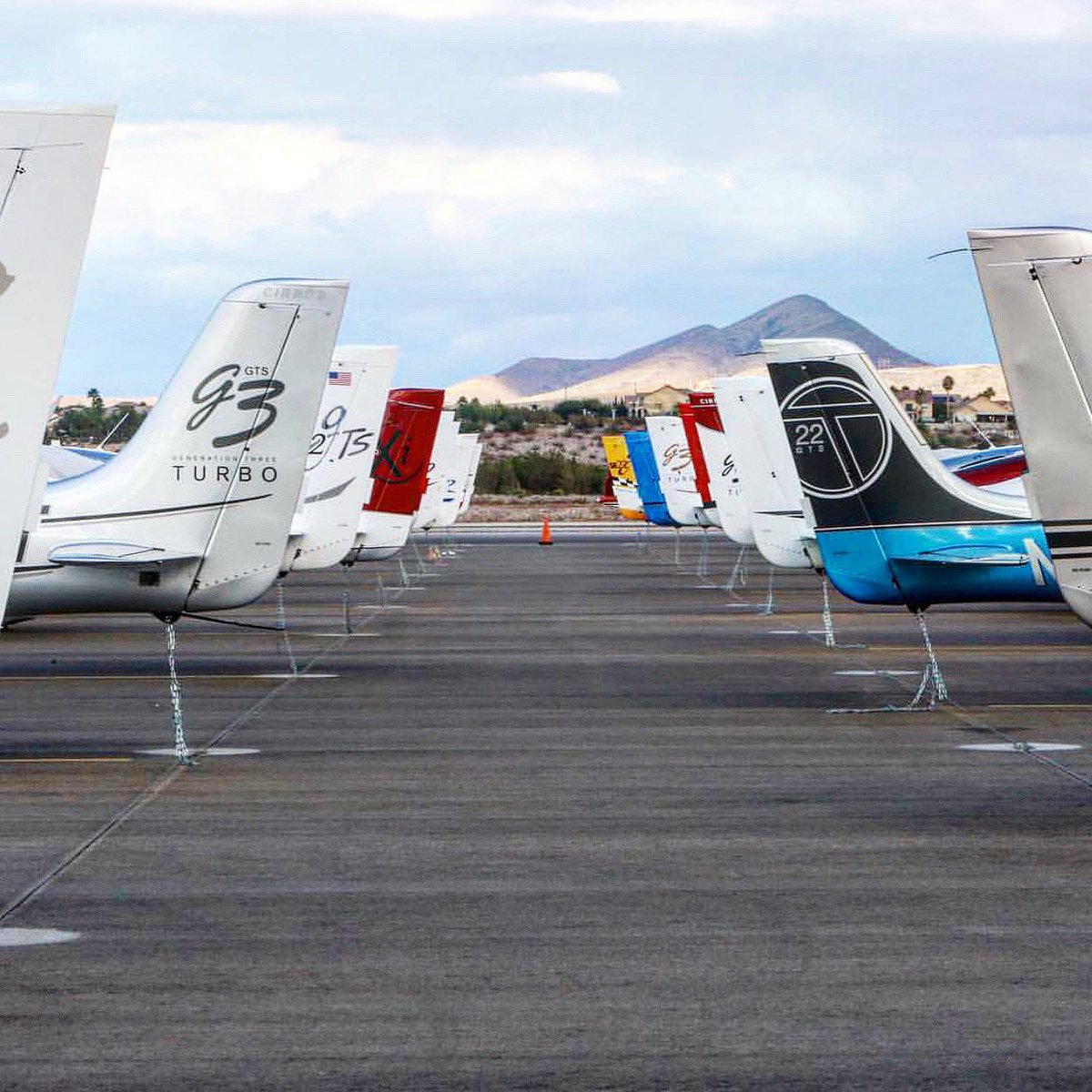 COPA_Pilot's tweet photo. It’s #TailTuesday! Check out all of the different paints going on in this picture. If you post a pic of your plane’s tail, make sure to tag #COPAPilot! #Cirrus #SR22 #CirrusLife #AvGeek #Flying https://t.co/Aqjp09lXDC