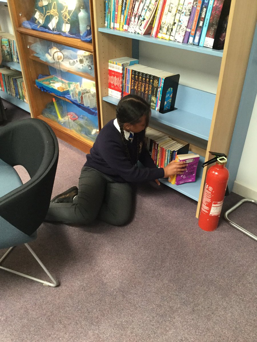 The junior librarians were hard at work today keeping the library tidy! Here is one putting away books by my favourite author <a href="/redbreastedbird/">Robin Stevens Updates</a>.