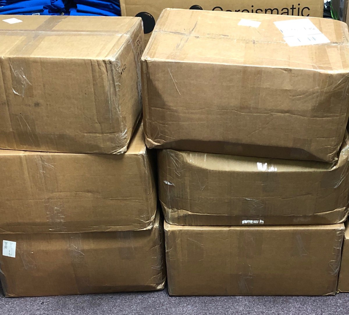 See these boxes?  We just got in a shipment of scrubs from a new vendor and we are super excited.  Stay tuned for more details coming soon!