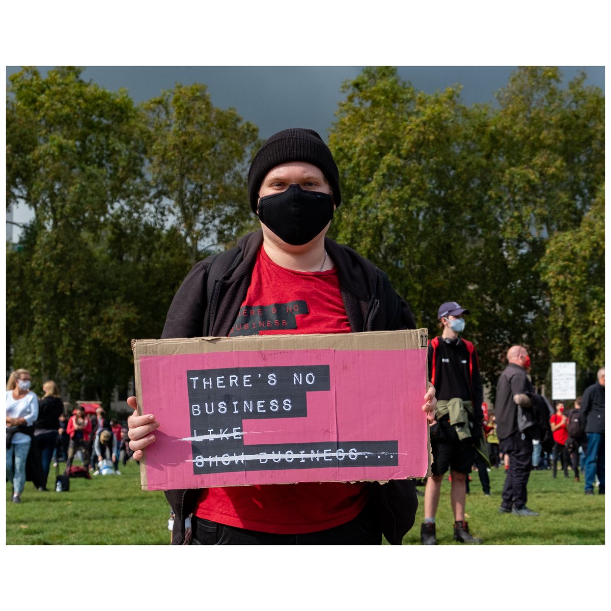 PaulAdrianEmery's tweet photo. Stand as ONE 
Event industry colleagues gathered for a socially distanced 30 minute silent demonstration outside Parliament to demand continuing financial support for everyone in the sector continuing to be affected by the shutdown of events.

@WeMakeEventsoff https://t.co/ImVCkUvxvs