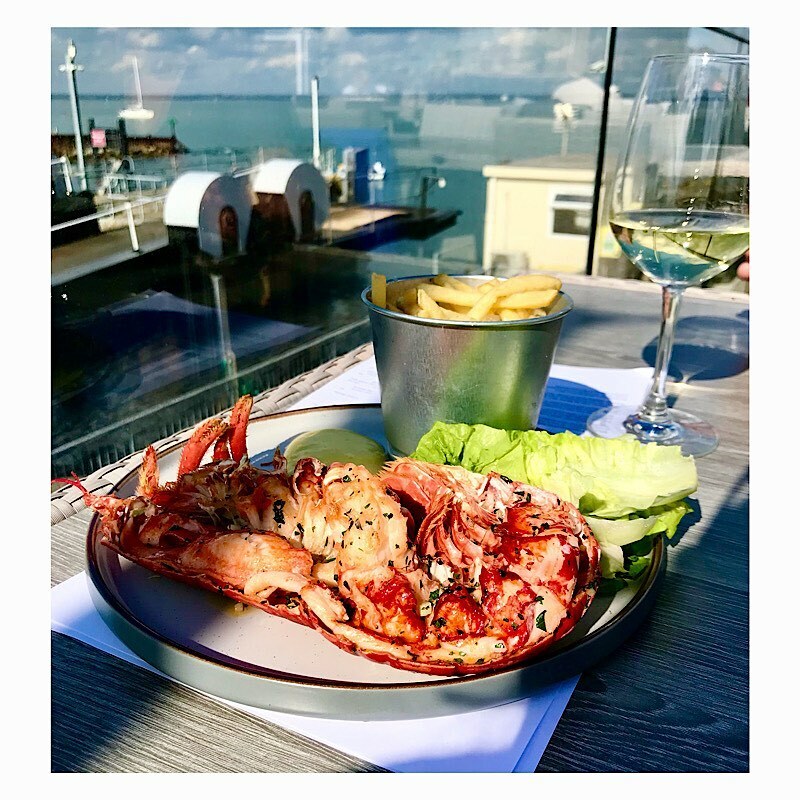 Spectacular lunch at the @the_terrace_yarmouth - the lovely <a href="/eaterwriter/">Tom Fahey</a> even arranged for the sun to come out while we ate lobster, aioli and fries, roast cod, salt and pepper pepper squid,  crispy cheese curd and many other good things. There might als… instagr.am/p/CFuQkbAn9kX/